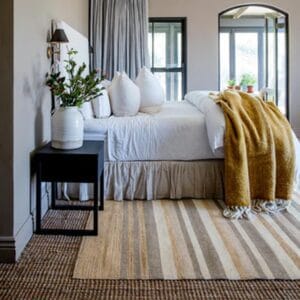 Expertly handwoven with a blend of soft and robust materials including jute, wool, and cotton. Featuring a striking combination of bold stripes and earthy colours, this piece will upgrade any indoor living space for years to come.