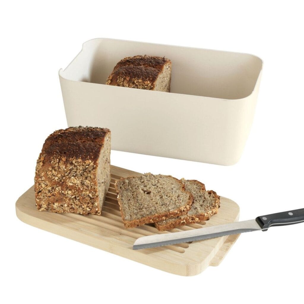 Practical, attractive, high-quality, sustainable bamboo fibre subtle beige bread box with a bamboo lid.. A multifunctional helper in any household the attractive bamboo lid serves simultaneously as a robust chopping board.