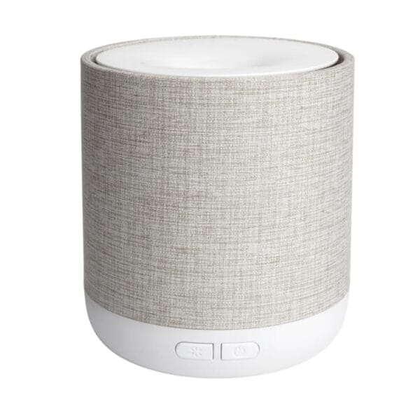 The Oasis fabric ultrasonic diffuser, where functionality meets design complimenting any modern home. Has the ability to be set to breathing mode - lighting up gradually and slowly fading down, assisting in meditation or therapeutic breathing.