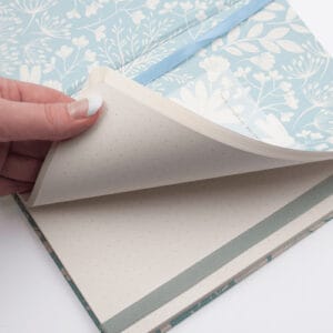 Embrace the crisp morning air with coffee filling the air as you jot down all your thoughts in this beautiful winter garden inspired journal.