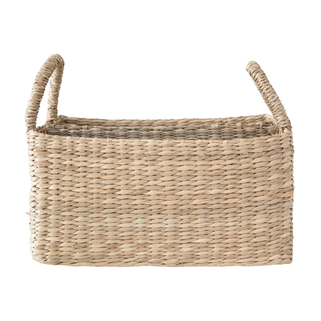The multiuse Minya caddy is a handwoven wonder that will bring rustic charm to kitchen and dining areas, bathrooms or home offices. Featuring two compartments and made of 100% seagrass, a resilient natural fibre, this organisational accent works wonderfully as a condiment, napkin or cutlery holder, as a handy place to keep stationery or as a receptacle for bathroom essentials.