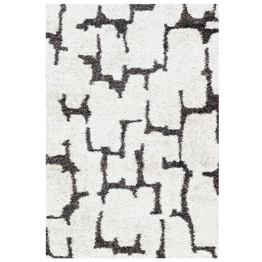 Durable 100% polypropylene shaggy rug made in Belgium, crafted with precision and quality. Their supple yet strong fibres resist wear and tear, making them perfect for high-traffic areas, while their contemporary patterns will instantly refresh living spaces. A practical and stylish choice for modern homes. Available in two sizes.