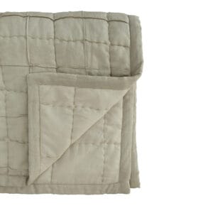 The hand-finished Anthology quilt features a classic pattern that evokes the nostalgia of hand-sewn quilts, while two subdued colourways give it a contemporary twist. With its delightful blend of soft cotton and durable linen, this quilt will be your perfect companion for cool evenings and lazy mornings. Cotton & linen blend with a microfiber filling and 100% cotton backing. Made in India