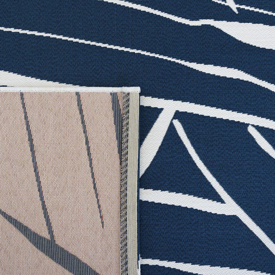 Elevate the aesthetic appeal of undercover outdoor spaces, while offering practicality for everyday use with island style patio rugs. Composed of a blend of 74% polypropylene and 26% polyester, these rugs are made to withstand the rigours of outdoor environments while providing a comfortable, inviting surface. Breezy designs will bring a laid-back feel to any outside area. Available as rectangular and round rugs.