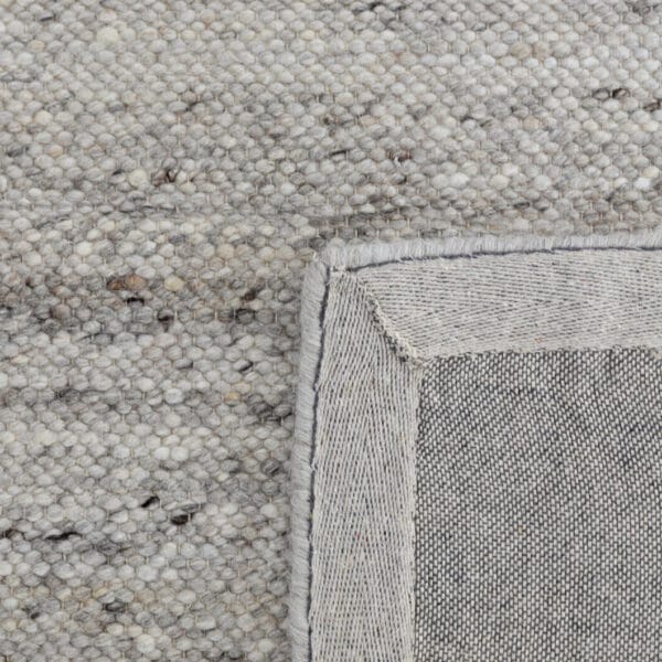 Embrace understated elegance with Harmonise rug, easy-to-style foundational pieces that blend functionality and comfort. Composed primarily of wool and featuring four neutral shades, these rugs will complement any decor scheme, while creating a warm and inviting atmosphere in your home. Handwoven in India for lasting quality and timeless elegance 90% Wool, 10% Cotton.