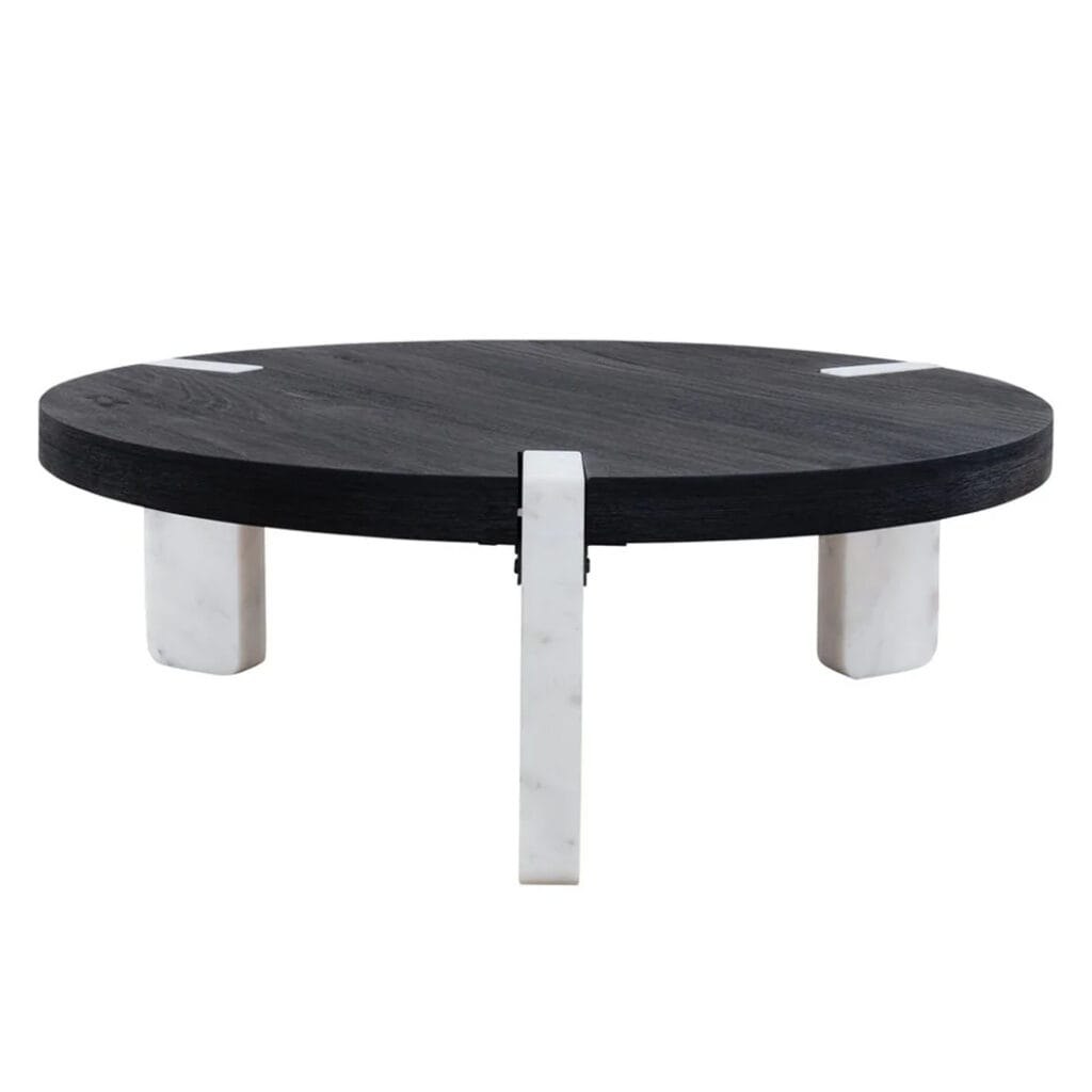 Osiris side and coffee tables marry timeless elegance with modern functionality. Composed of a mango wood top that exudes warmth, and sleek matte marble legs that add a touch of opulence, these pieces will set the tone for design-forward contemporary living. Minor assembly required.