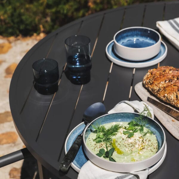 Embrace warm weather and outdoor entertaining with the handmade Serengeti outdoor table collection, elegantly crafted from 100% aluminium and featuring both round and rectangular tabletops. The tables come in easy-to-style colours and various sizes: rectangular tables with open slats that seat four, six to eight, or eight to 10 people, as well as round four-seater and six-seater tables. Suitable for indoor and outdoor use.