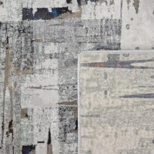 Part of the Fiery Impulses collection, the Dynamic rug will lighten up a room, while infusing it with a sense of contemporary elegance and artistic allure. Grey-white tones serve as a versatile backdrop, allowing the rug's abstract motif to command attention without overwhelming a room’s ambiance. Available in one generous size.