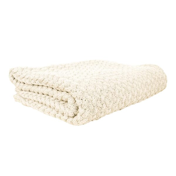 Lounge about in luxury with the Kensington throw, a 100% cotton cable knit fashioned from sumptuous three-ply yarn. An intricate cable knit design and four downbeat shades give these throws their cosy yet classic look. Drape the Kensington over your favourite armchair, at the foot of a bed or around your shoulders on chilly evenings.