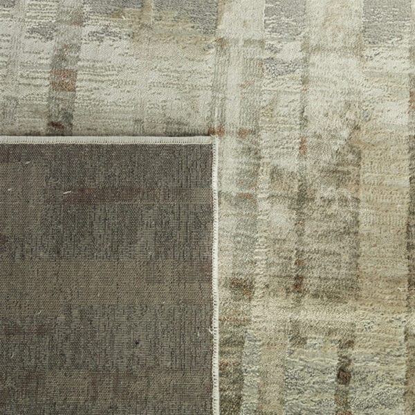 Ether rugs bring the luxurious softness of viscose and the durability of polyester to the floor. This beautiful blend coupled with their smooth, soft feel underfoot make these rugs as comfortable and they are stylish. Available in two versatile colourways and three sizes. Viscose cut-pile rug with polyester shrink yarn. Made in Belgium.