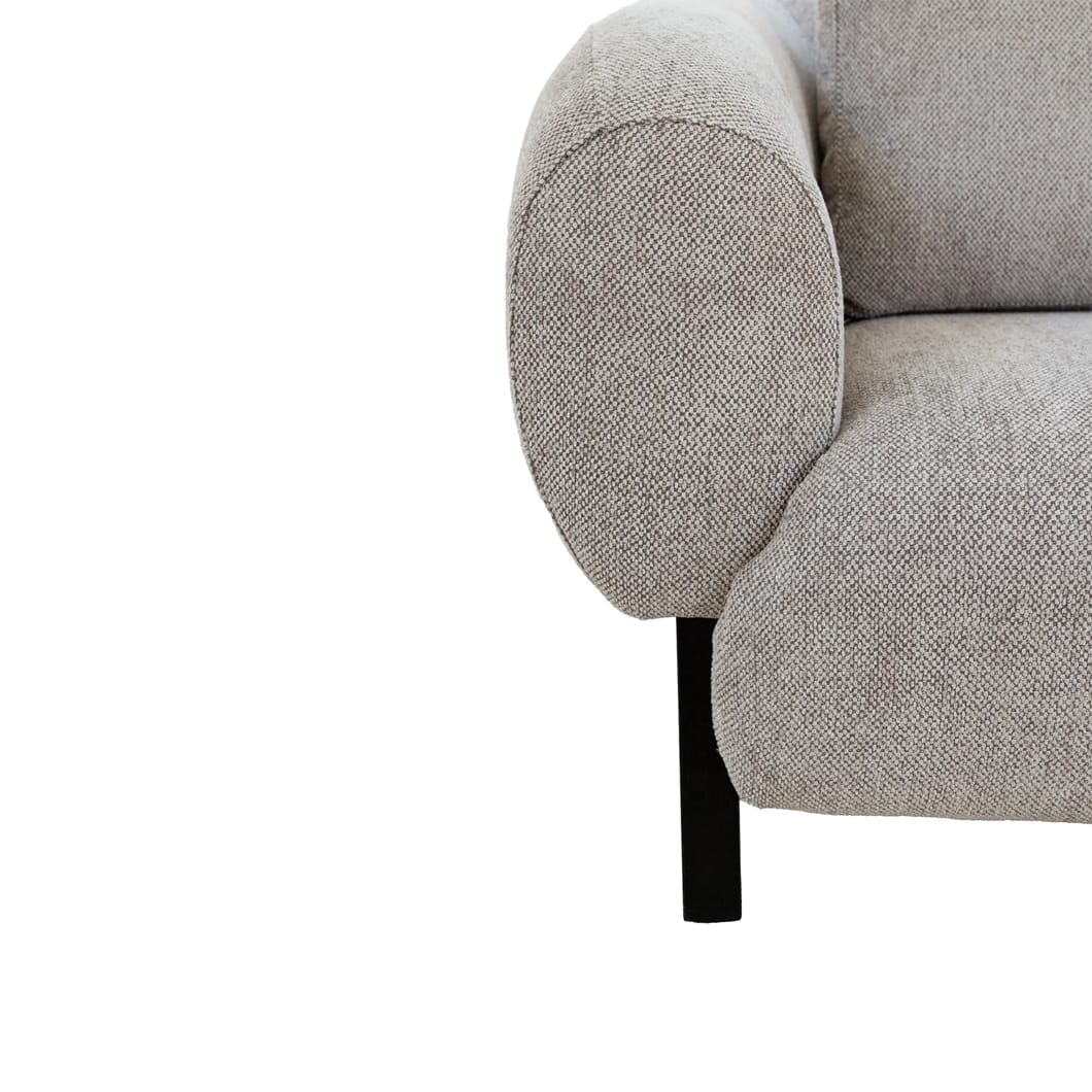 Modern elegance characterises the Juliette sofa, which will effortlessly elevate the look of living areas. Upholstered to perfection (59% Polyester, 41% Viscose) , the sofa comes in one neutral tone, offering a versatile foundation for layering textures and accents. An ash wood frame supports this stylish seater. No assembly required.