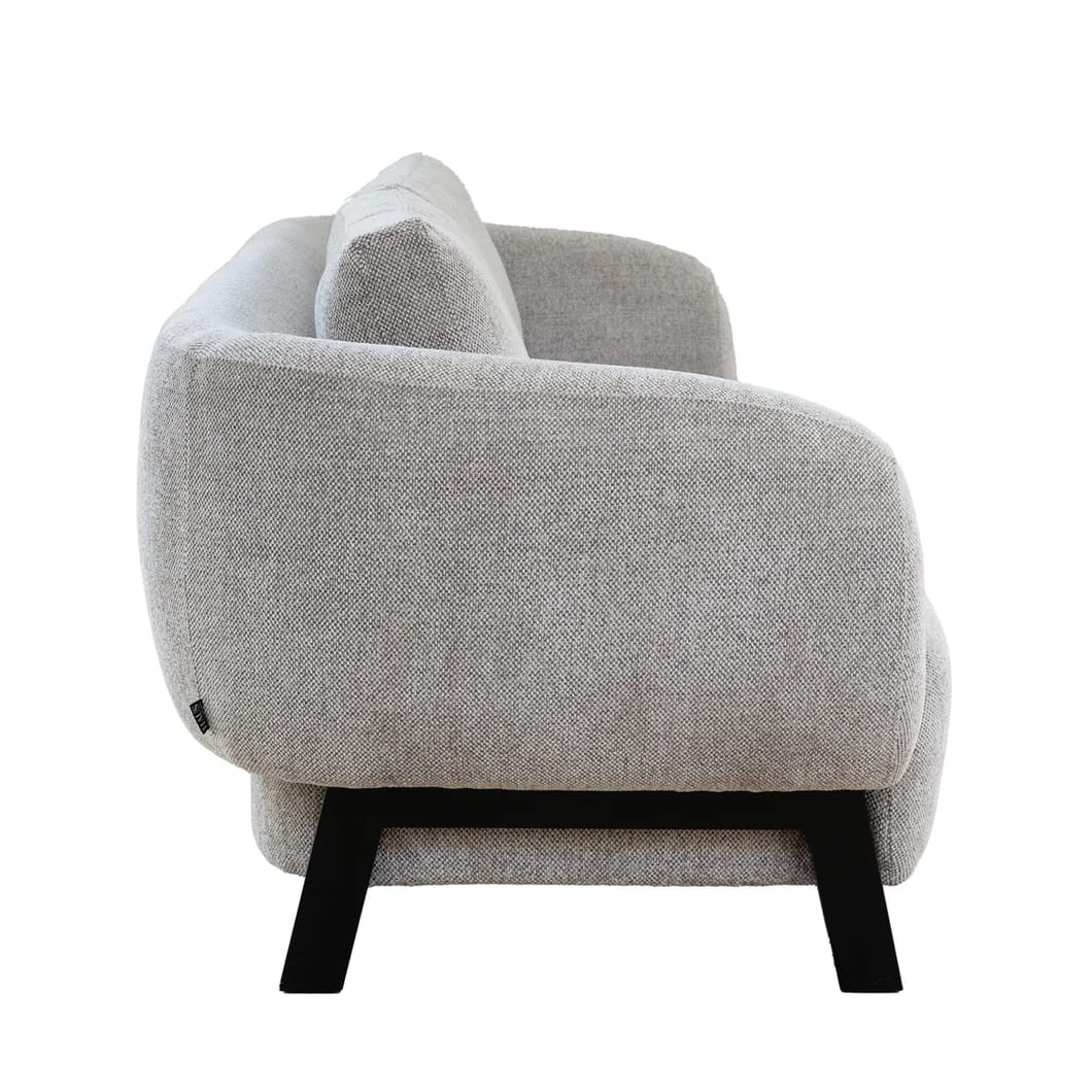 Modern elegance characterises the Juliette sofa, which will effortlessly elevate the look of living areas. Upholstered to perfection (59% Polyester, 41% Viscose) , the sofa comes in one neutral tone, offering a versatile foundation for layering textures and accents. An ash wood frame supports this stylish seater. No assembly required.