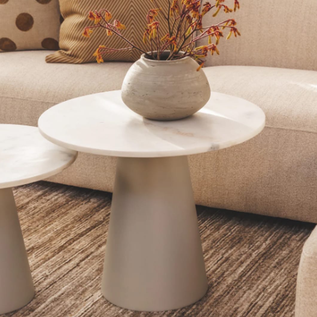 With its harmonious blend of material, the Whisp side table set is a celebration of modern design. A luxurious tabletop made of honed Morchana marble features soft, swirling veins and a smooth, cool surface, while a cone-shaped steel base adds a striking contrast. Flank a plush sofa with this stunning set, frame a fireplace or set it next to your favourite chair.