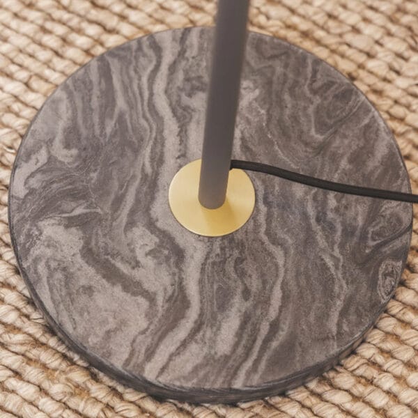 Composed of slim steel supports complemented with luxurious marble detail, Oslo lights offer both versatility and charm. The desk lamps adjustable arm bends and reaches wherever it's needed, adding a functional, stylish element to workspaces, while the floor lamp stands tall casting ambient light, bringing an elegant touch to living areas.